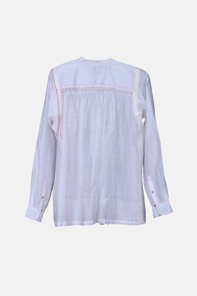 Shirt with pink stiching details